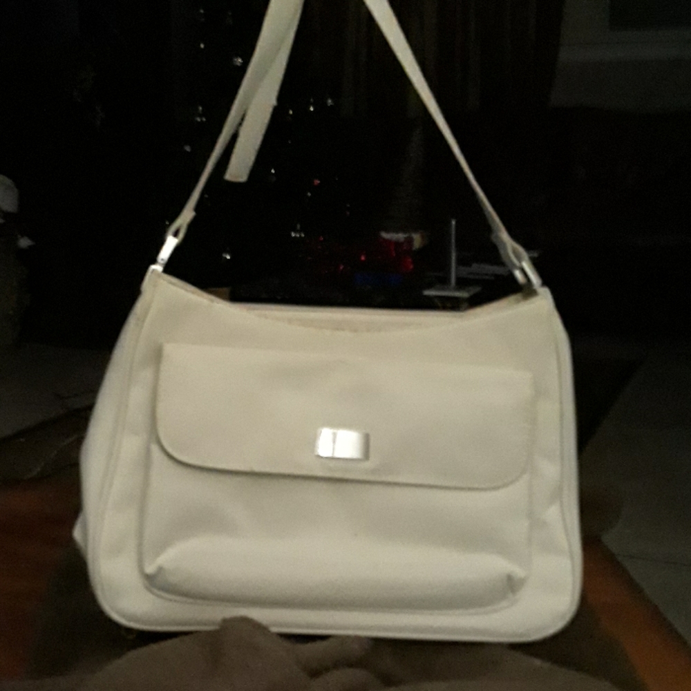 Granma purse plastic with lots of pockets.
